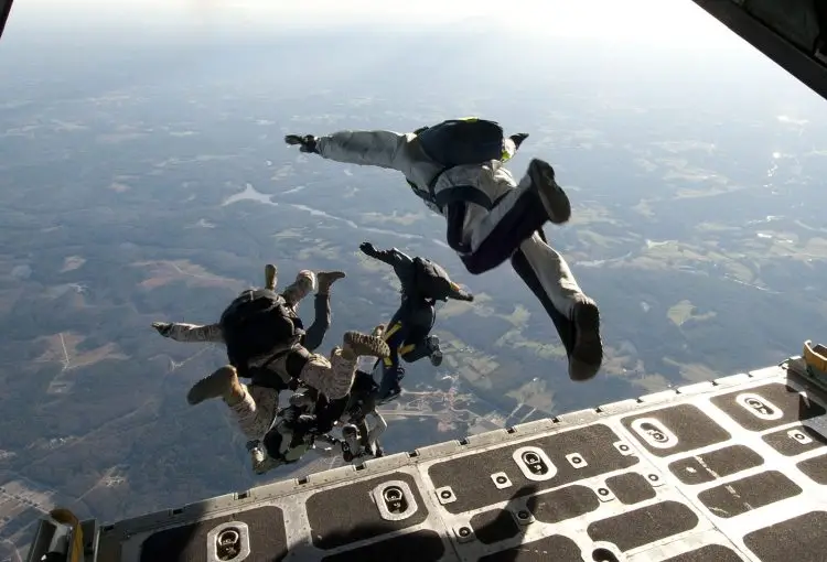 US Navy SEALs exit an aircraft during a training exercise