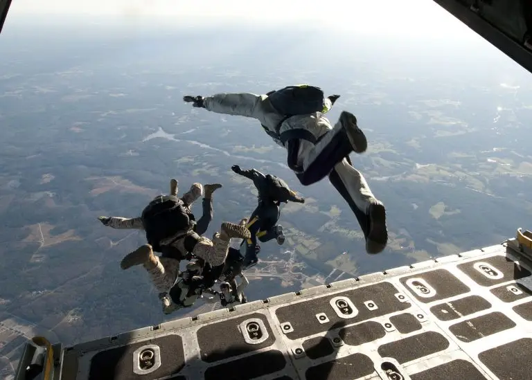 US Navy SEALs exit an aircraft during a training exercise